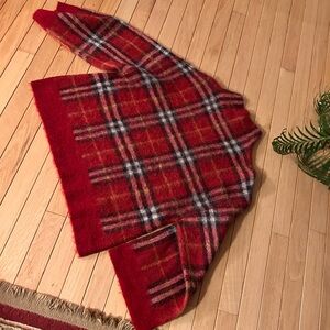 Women’s Something Navy’s plaid mock turtleneck.